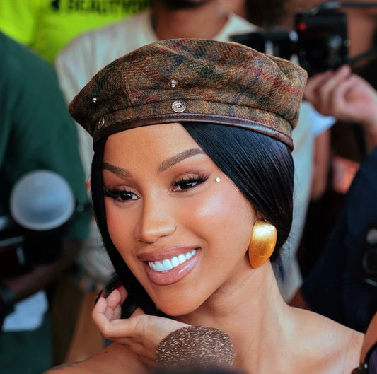 Cardi B Tries BeatGangBeauty Hydrating Lip Serum in Coco Colada at BeautyCon 2026